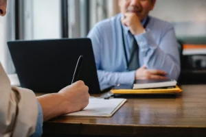 taking notes during an interview